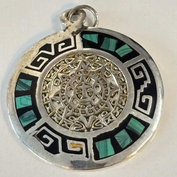 Jewelry - vintage sterling silver Aztec calendar pendant